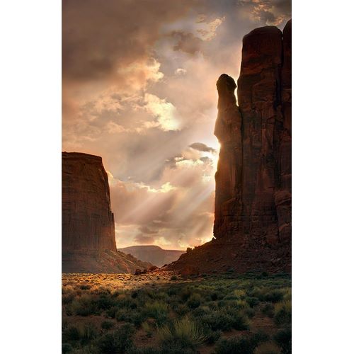 Light rays filter down into Monument Valley-on the Arizona and Utah border
